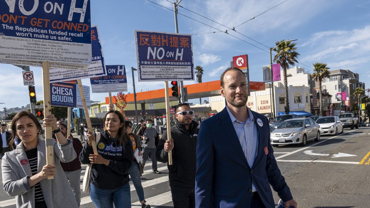 Chesa Boudin campaigning