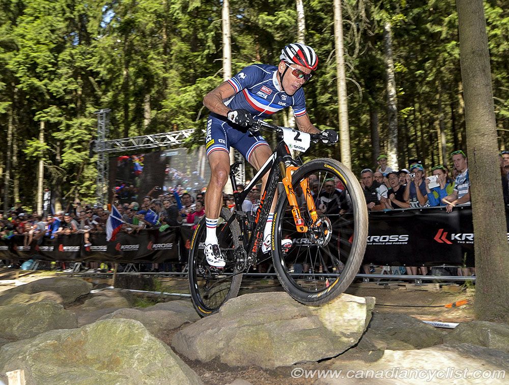 Julien Absalon (France) was chasing, but wouldn't join the leaders until the third lap
