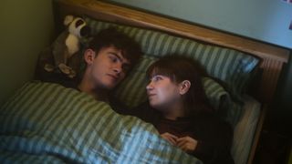 Heartstopper season 3 Charlie and Tori chat on his bed 