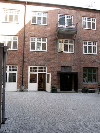 Exterior of the shop with cobbled courtyard