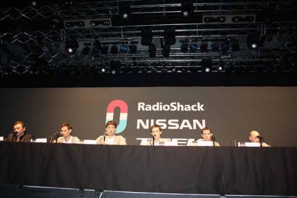 The RadioShack-Nissan team leaders flank Bruyneel