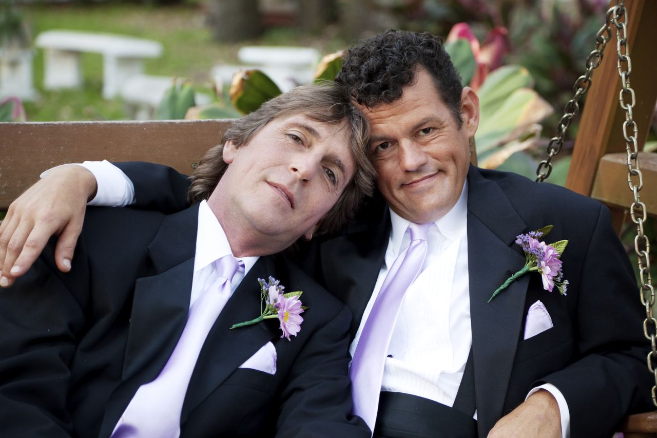 Gay couples are finding there&amp;#039;s a fine line between being able to marry and being forced to for health benefits