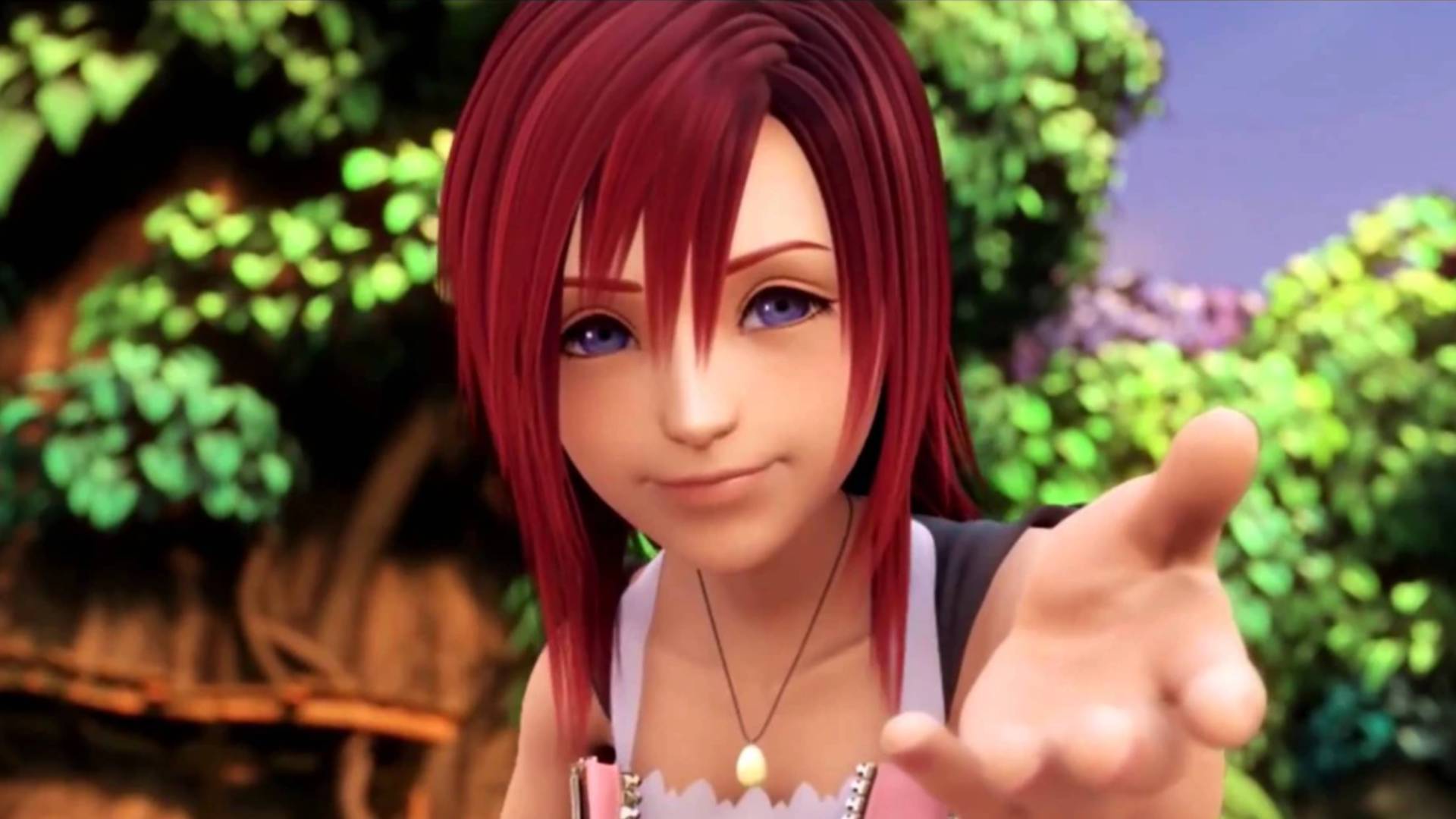 Kairi smiles as she reaches out her hand in Kingdom Hearts 2.