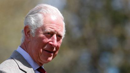 Prince Charles, Prince of Wales speaks with soldiers of the Welsh Guards during a visit to Combermere Barracks on May 5, 2021 in Windsor, England
