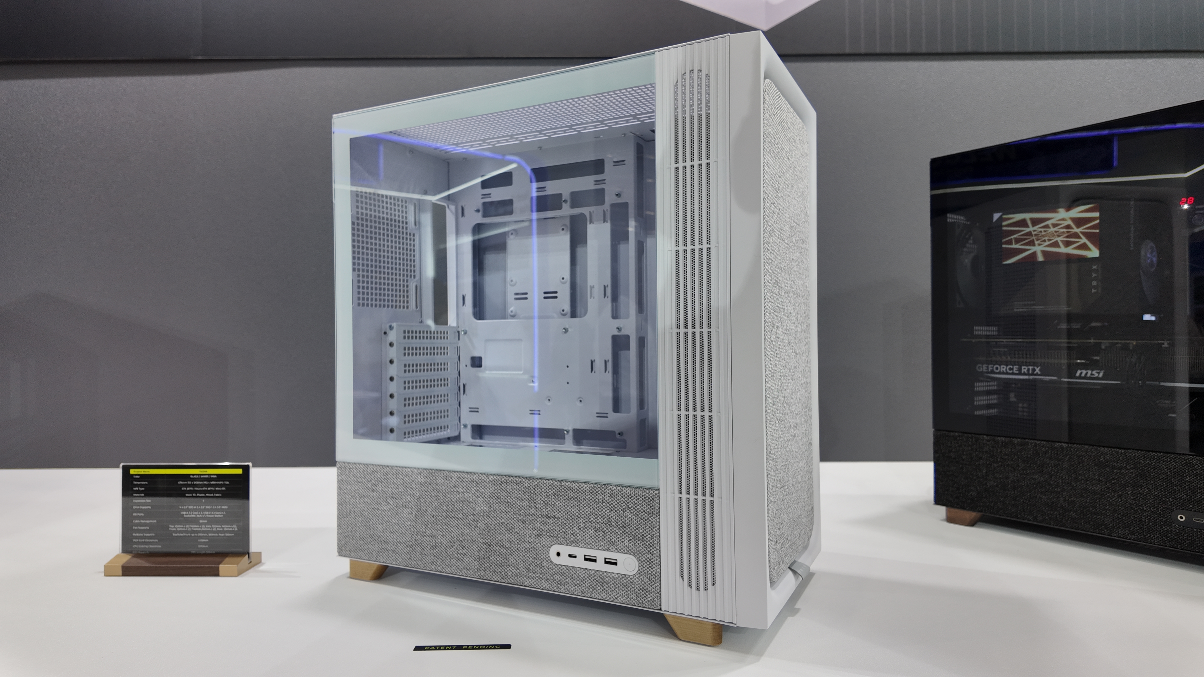 Tryx's Computex 2025 booth, showcasing various new PC cases and coolers.
