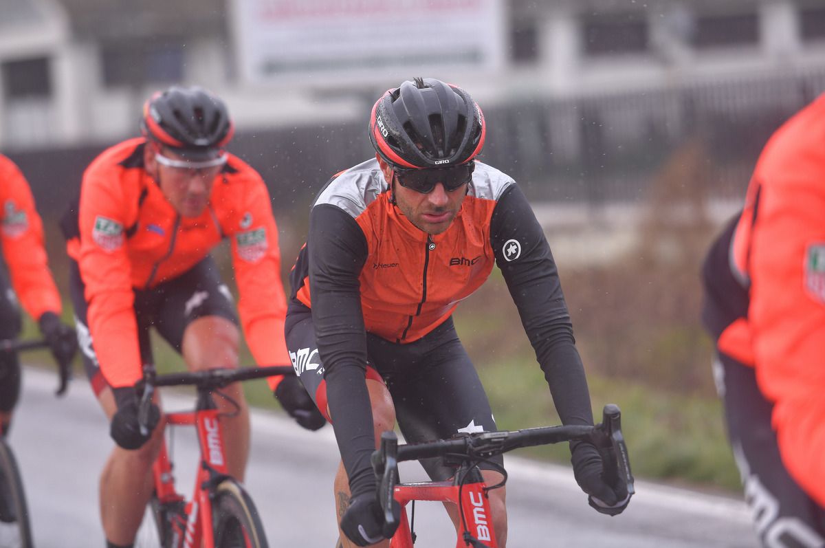 Damiano Caruso was rugged up for the early rain