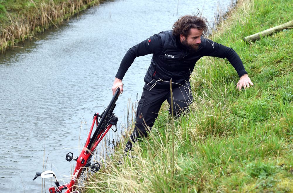Geert Steegmans's Trek bike is recovered after a crash