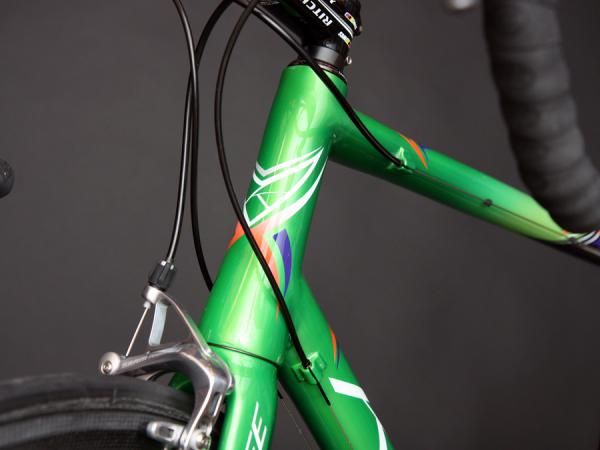 The tapered head tube of this KirkLee is neatly dressed up with flashy custom paint.