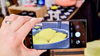 Samsung Galaxy S23 Ultra zoom camera on bowl of lemons