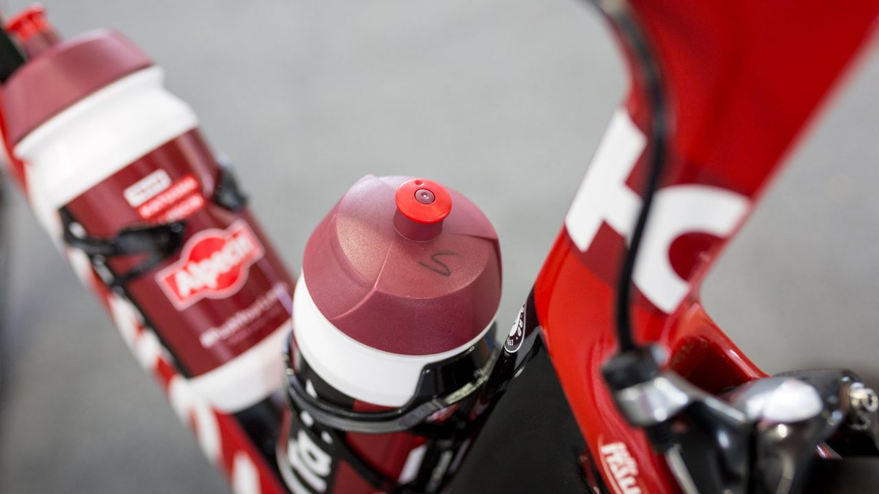 The bottles are marked to differentiate between water and sports drink