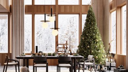 A large christmas tree in a dining room with floor to ceiling windows