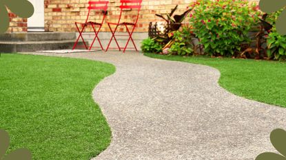 backyard with artificial lawn either side of a curved path to support how a guide on how to clean artificial grass