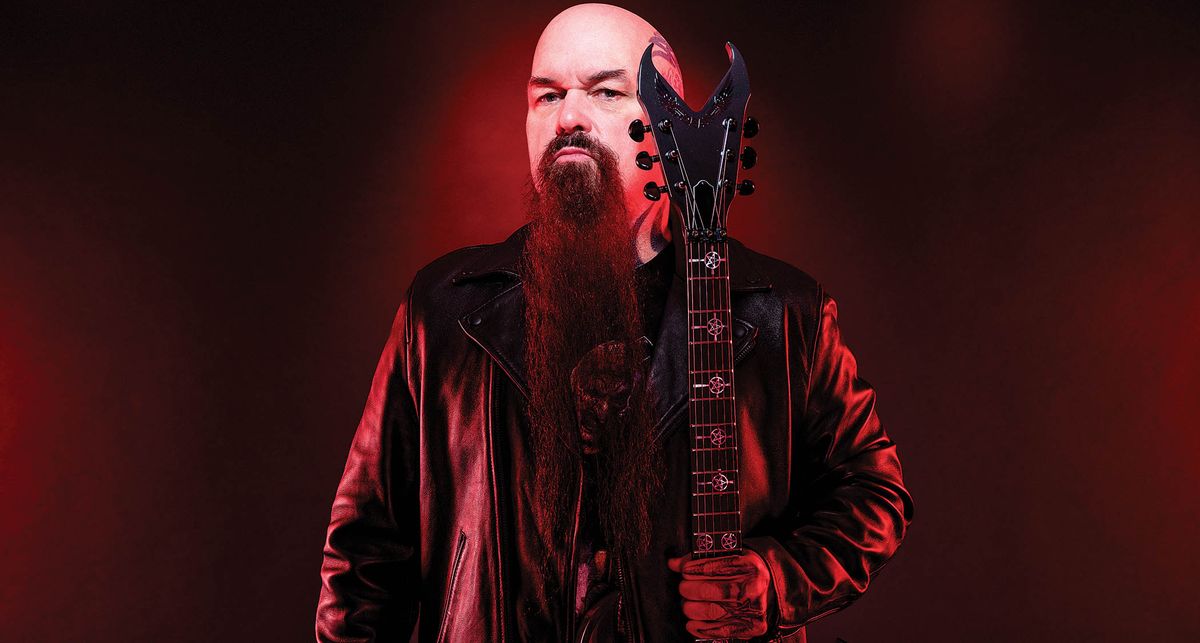 Kerry King lit up in red with his signature Dean Overlord