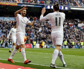 Karim Benzema and Gareth Bale celebrate a goal for Real Madrid against Rayo Vallecano in December 2015.