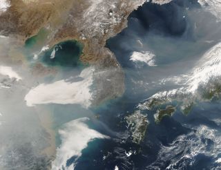 A hazy day in South Korea is clear in the North. This image from Feb. 6, 2007, was taken by NASA's MODIS instrument on the Aqua satellite.