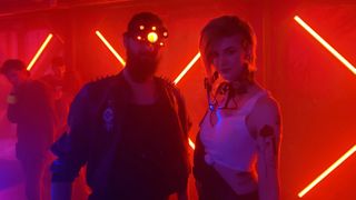 Cosplayers dressed as Judy and a scavenger from Cyberpunk 2077