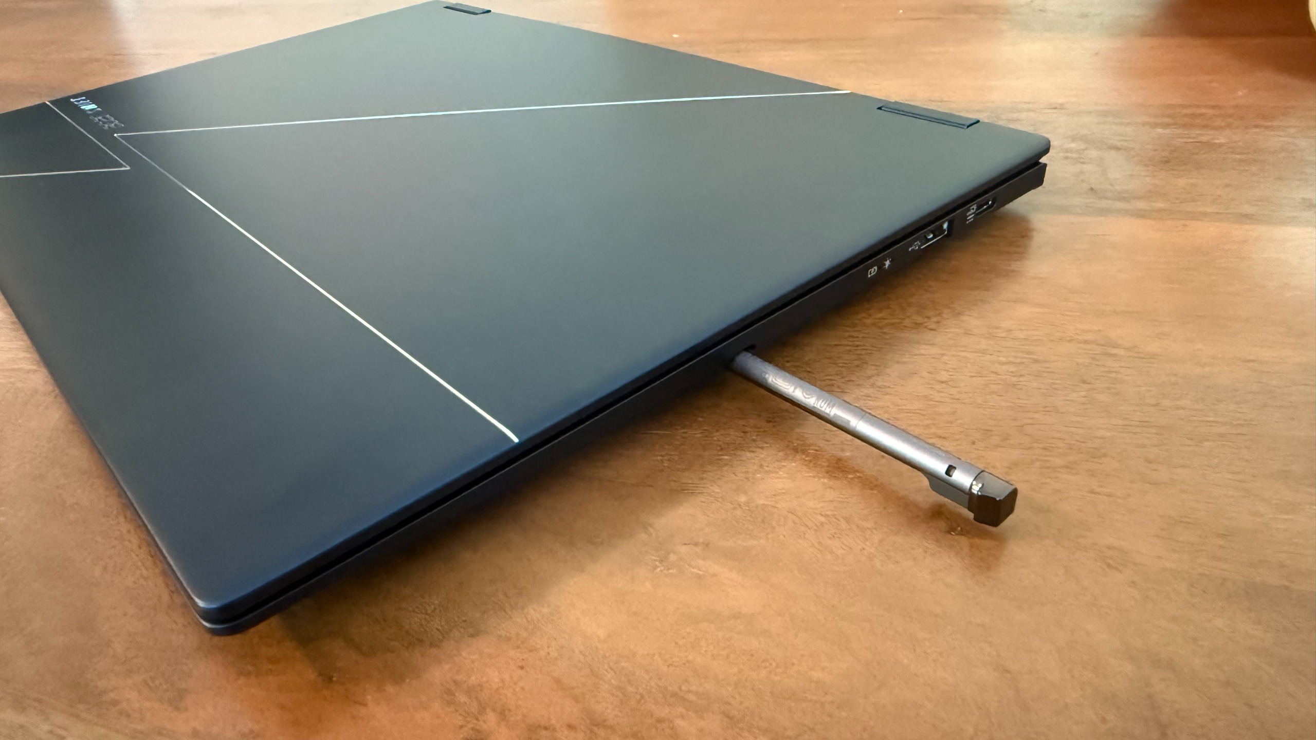 The Acer Swift Spin 14 AI not only has a USB-C port on the right side but storage for the included active stylus.