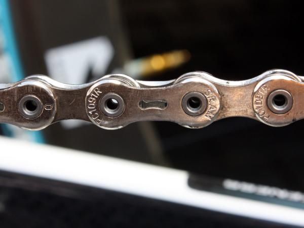 SRAM's new PC-1091R chain has made its rounds through the peloton now with all sponsored teams appearing to have replaced the old PC-1090R model with this one. Additional chamfering supposedly makes for quieter operation and smoother shifting than before.