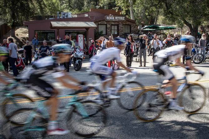 Riders pass by the famous Rock Store