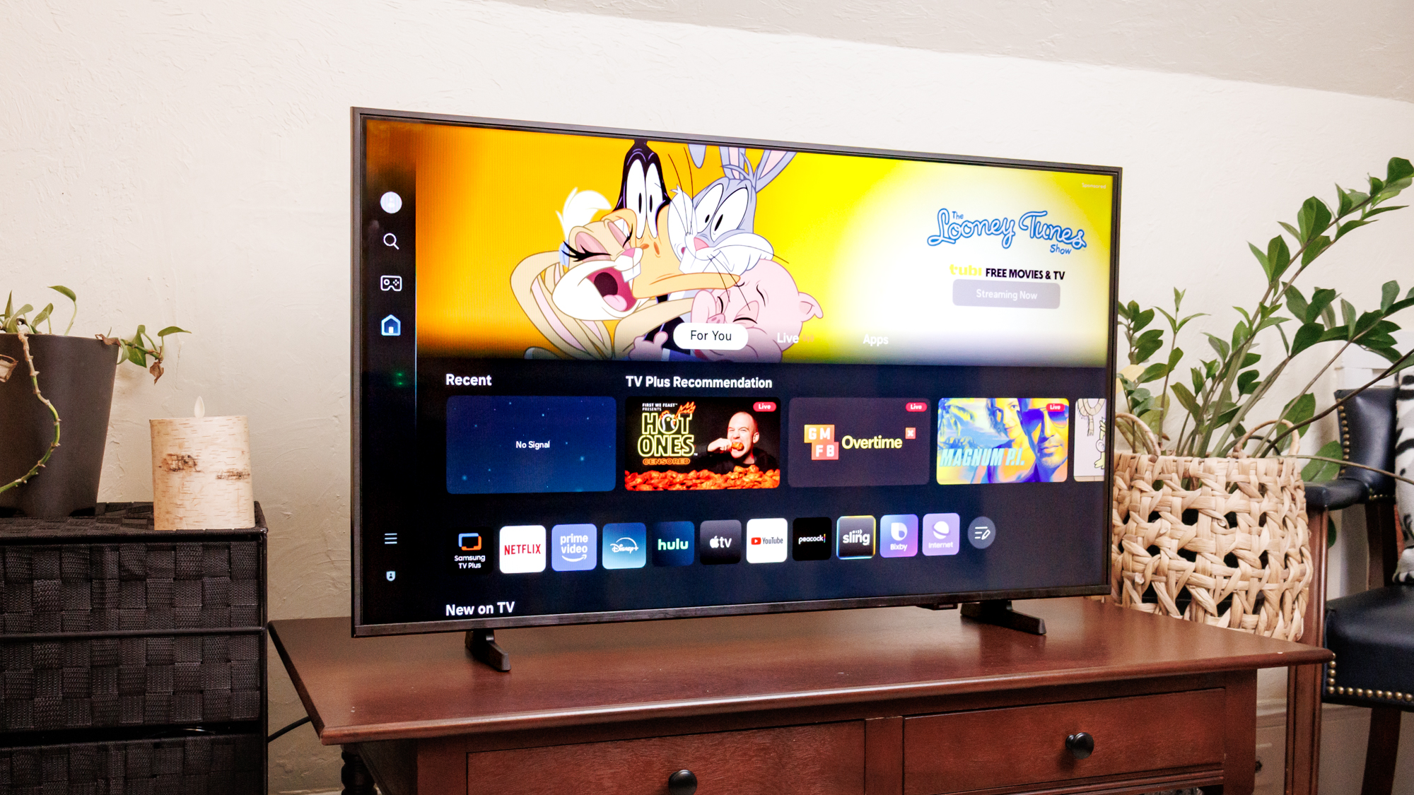 The Tizen streaming interface on a Samsung F6000F LED TV.