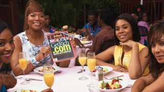 the group celebrating Sasha's Times cover in Girls Trip