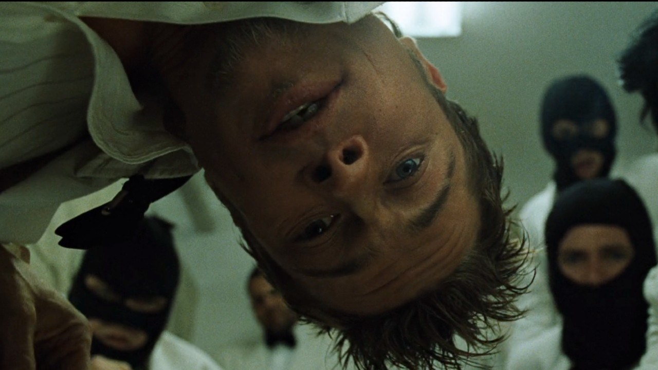 Brad Pitt as Tyler leaning down, he's upside down.