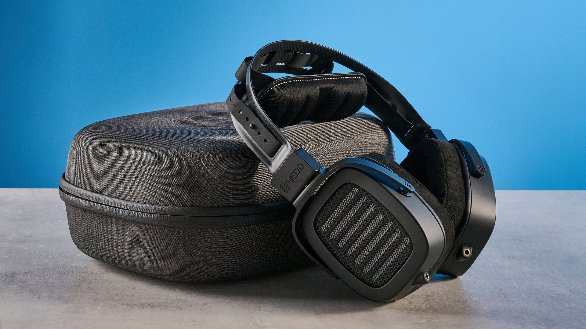 The HEDDphone TWO GT against a blue background