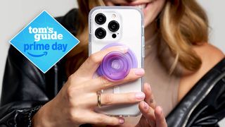 PopSocket being held by a woman.