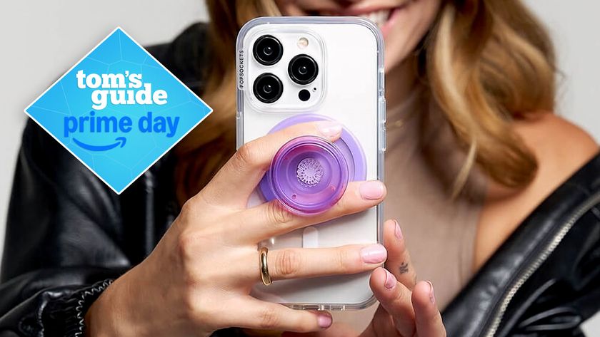 PopSocket being held by a woman.