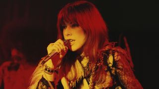 English singer and songwriter Sonja Kristina of the progressive rock band Curved Air, in concert, circa 1975. (Photo by Keystone/Hulton Archive/Getty Images)