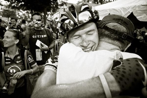 Newly crowned US pro road champion Ben King shares the moment with his father.