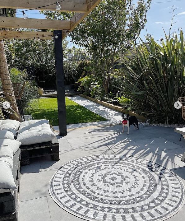 A patio with seating to the left