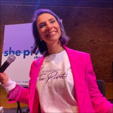 she pivots host Emily Tisch Sussman wearing a sweatshirt