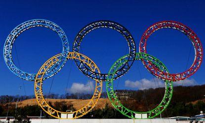 The Olympic rings stand outside of Sochi International Airport in Alder, Russia. The Games begin Feb. 6.