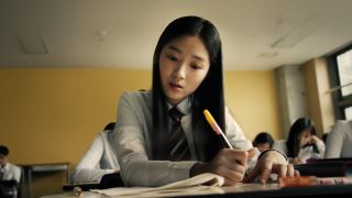 a high schooler (Kim Hye-yoon) takes a test, in Netflix k-drama 'SKY Castle'