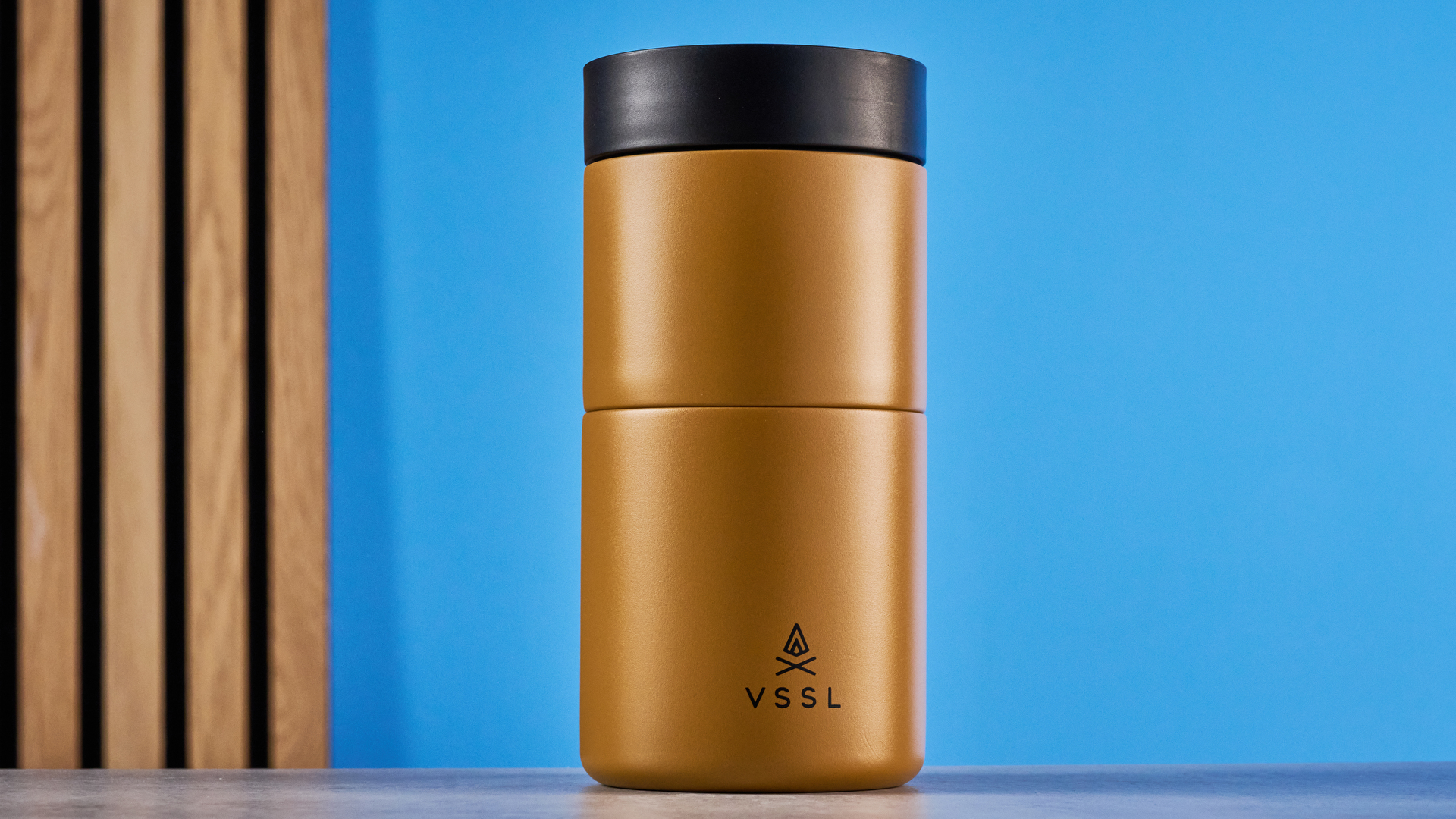 the VSSL Nest Pour Over Coffee Set in gold photographed against the blue tom's guide background