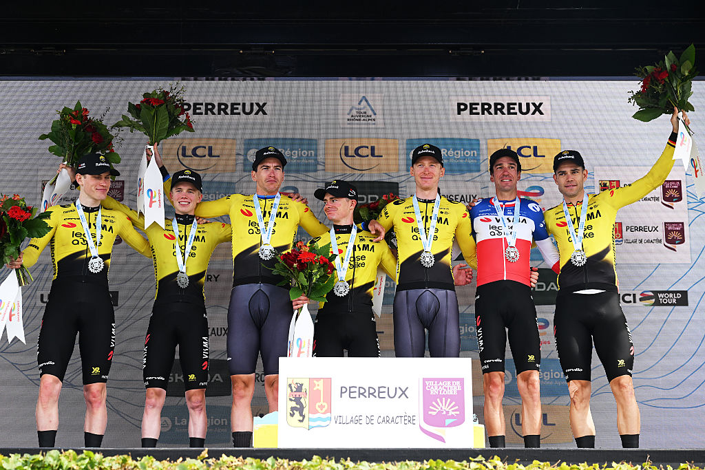 PERREUX, FRANCE - JUNE 09: Matteo Jorgenson of United States, Edoardo Affini of Italy, Bruno Armirail of France, Per Strand Hagenes of Norway, Jorgen Nordhagen of Norway, Ben Tulett of Great Britain, Wout van Aert of Belgium and Team Visma | Lease a Bike celebrate at podium as stage winner during the 78th Tour Auvergne-Rhone-Alpes 2026, Stage 3 a 28.4km team time trial stage from Perreux to Perreux / #UCIWT / on June 09, 2026 in Perreux, France. (Photo by Dario Belingheri/Getty Images)