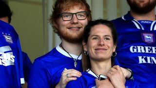 Musician Ed Sheeran and fiance Cherry Seaborn look on during the Sky Bet Championship match between Ipswich Town and Aston Villa at Portman Road on April 21, 2018 in Ipswich, England