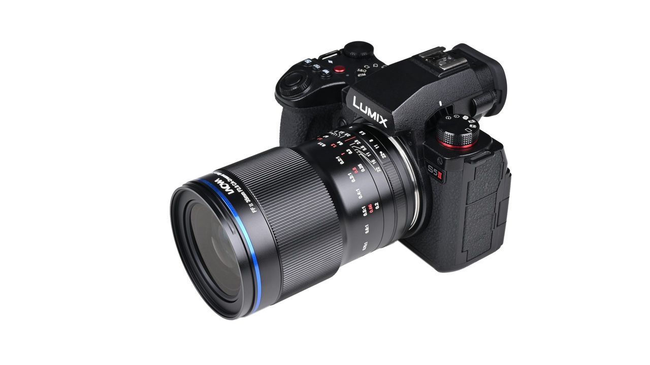 Laowa Acris 35mm f/2.8 1x Macro Apo lens mounted to a camera against a white background