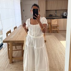 Woman wears pretty summer blouse