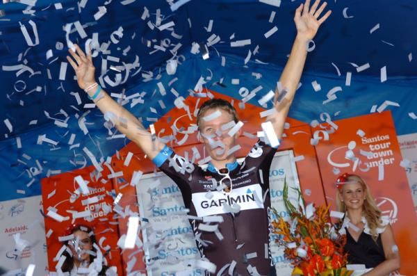 Meyer raises his arms on the podium, winning Garmin-Cervelo their first TDU title