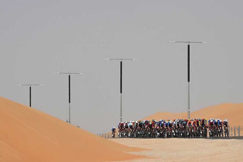ABU DHABI, UNITED ARAB EMIRATES - FEBRUARY 16: A general view of the peloton passing through a landscape during the 8th UAE Tour 2026, Stage 1 a 144km stage from Madinat Zayed Majlis to Liwa Palace on February 16, 2026 in Abu Dhabi, United Arab Emirates. 