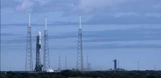 Twin SpaceX Falcon 9 rockets can be seen in this single shot, taken at Kennedy Space Center before the company's latest Starlink launch attempt Oct. 1, 2020, which was scrubbed. SpaceX continues to launch batches of its Starlink satellites, working to build a constellation of satellites to provide internet service here on Earth.