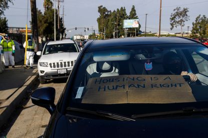 Protest sign outside Los Angeles encampment 