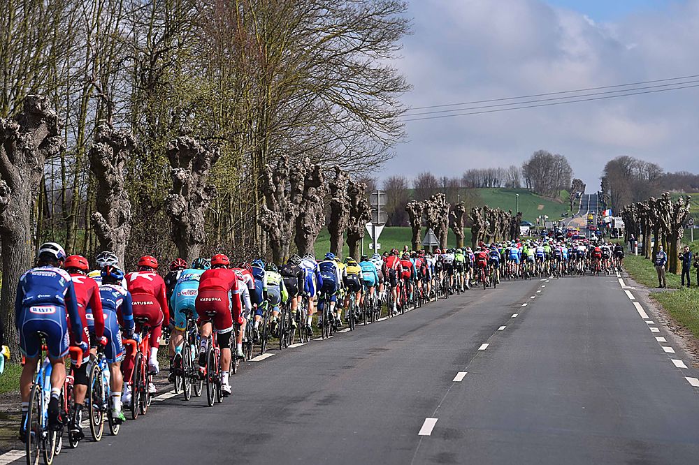 The peloton lined out at the start of Paris-Roubaix
