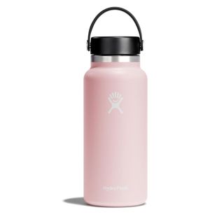 A pastel pink HydroFlask water bottle with a handle lid