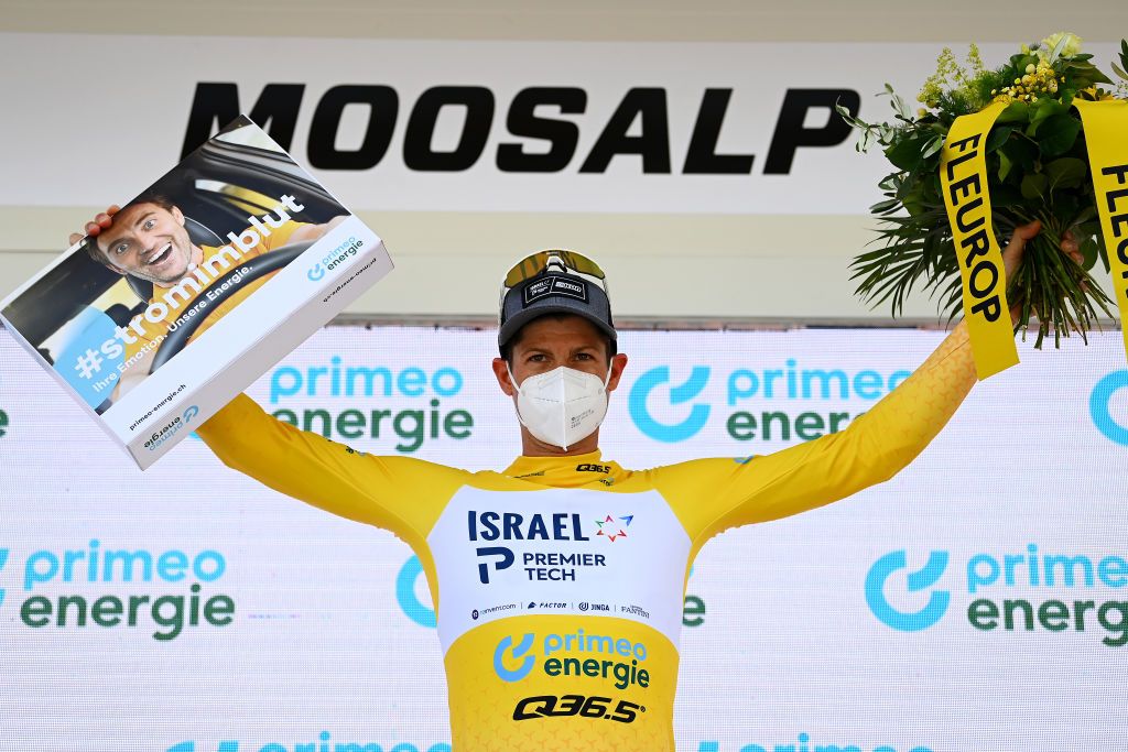 MOOSALP SWITZERLAND JUNE 17 Jakob Fuglsang of Denmark and Team Israel Premier Tech Yellow Leader Jersey celebrates at podium during the 85th Tour de Suisse 2022 Stage 6 a 1775km stage from Locarno to Moosalp 2048m ourdesuisse2022 WorldTour on June 17 2022 in Moosalp Switzerland Photo by Tim de WaeleGetty Images