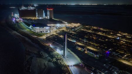 SpaceX rolls its Super Heavy booster out to the pad ahead of Starship's 14th flight test, which is targeted for Sept. 28, 2026. SpaceX posted this photo on X on Sept. 21.