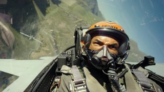 Greg Tarzan Davis in jet cockpit in Top Gun: Maverick