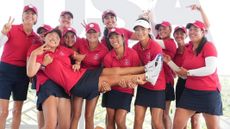 Members of the US Junior Solheim Cup team celebrate their win